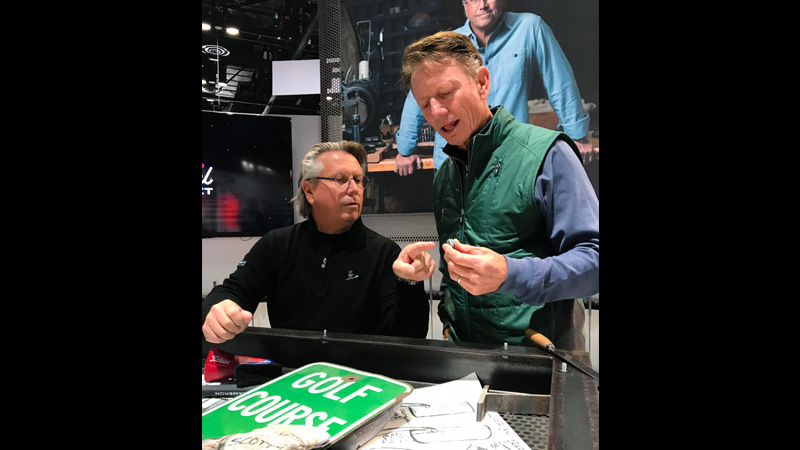 Brad Faxon checking out some of Scotty's creations. 